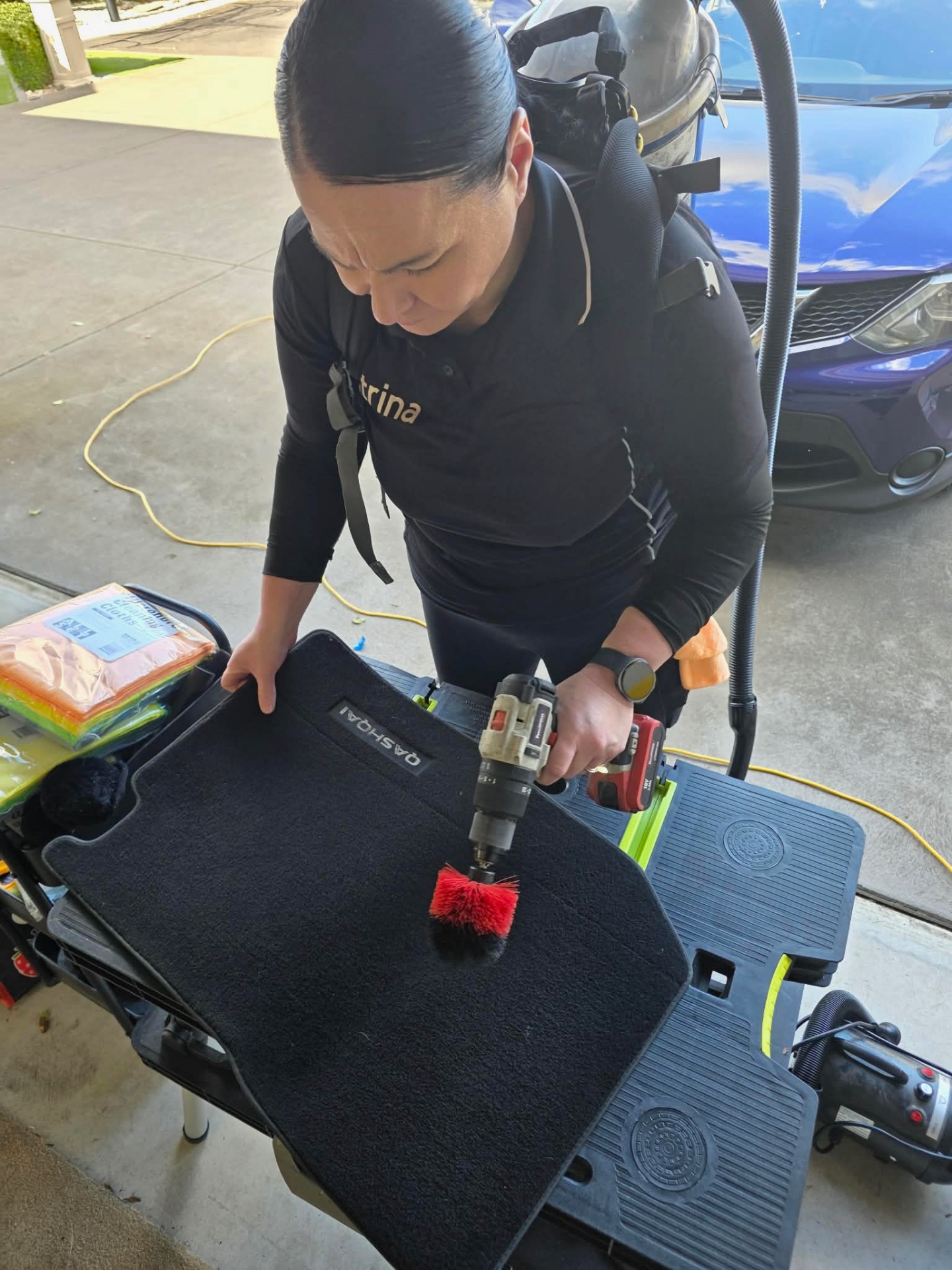 Drill-brush deep clean of a car floor mat, part of No.1 Cleaning's car detailing service